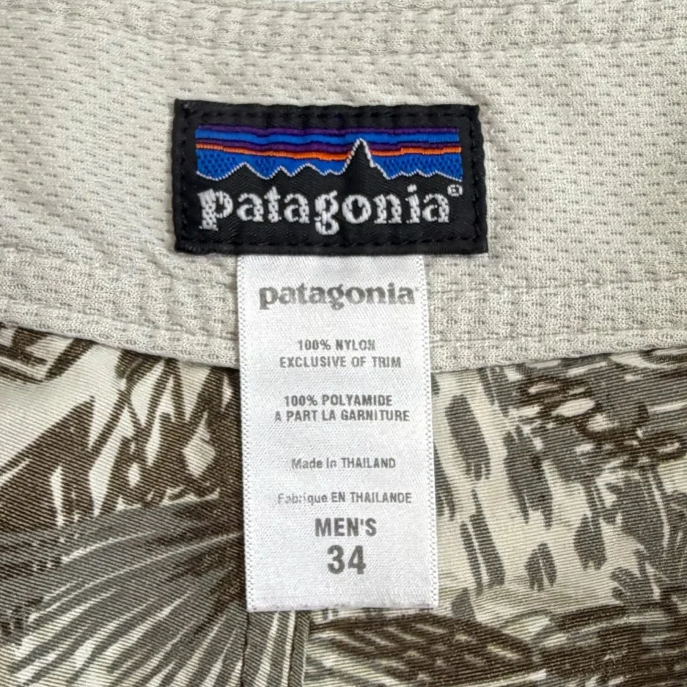 Patagonia Brown and Cream Patterned Board Shorts. Size 34/M.